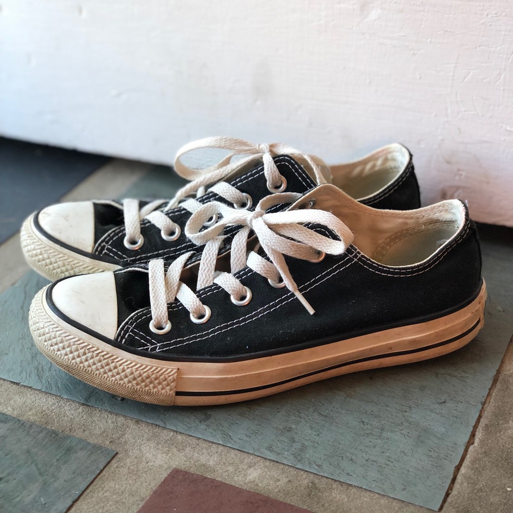 Woman’s black converse